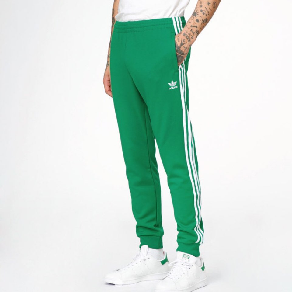 Зеленые лампасы. Adidas Originals штаны мужские мятные. Adidas зеленое трико адидас. Штаны adidas Bolt Green. Брюки спортивные adicolor Classics женские adidas.