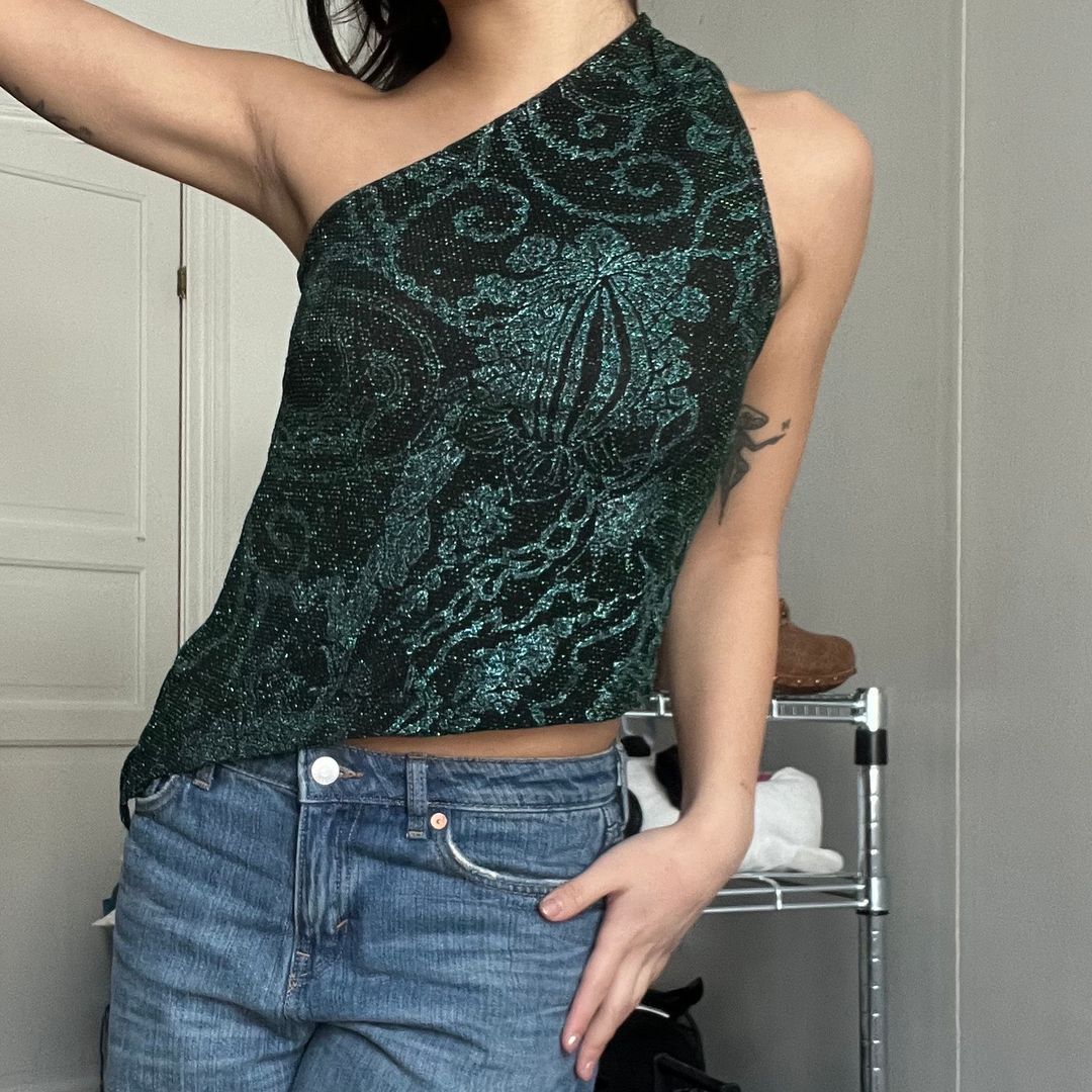 asymmetrisk topp • Tise