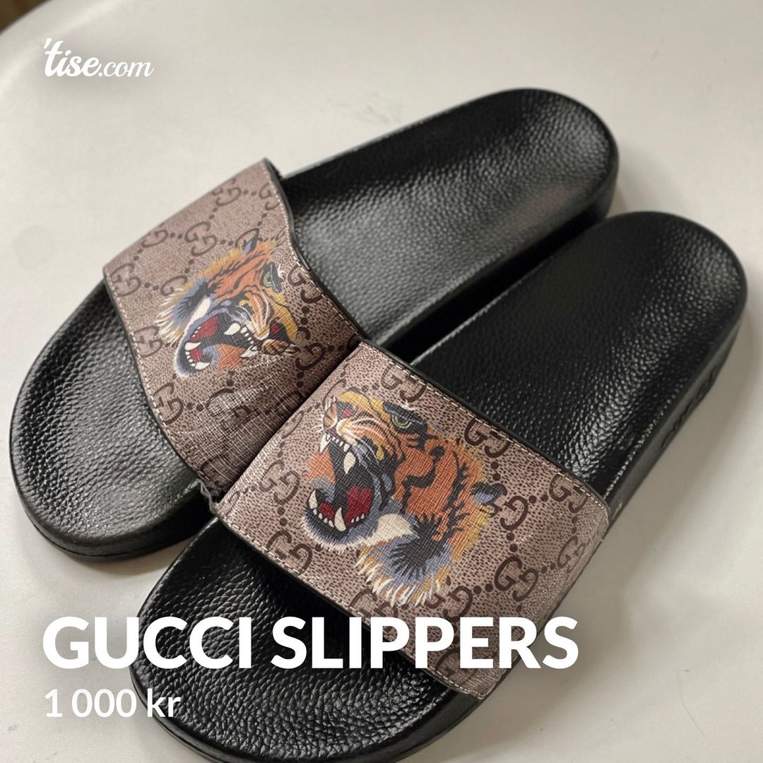 Gucci store tiger slippers